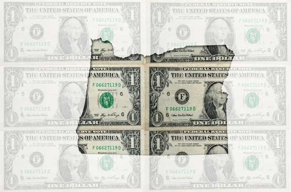 Окреслити карта Орегон з прозорого американський долар банкнот — стокове фото
