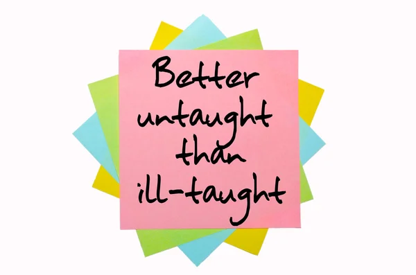 Proverb "Better untaught than ill-taught" written on bunch of st — Stock Photo, Image