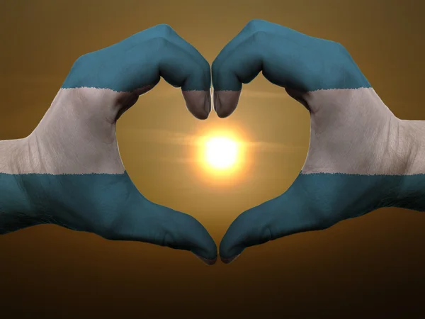 Heart and love gesture by hands colored in el salvador flag duri — Stock Photo, Image