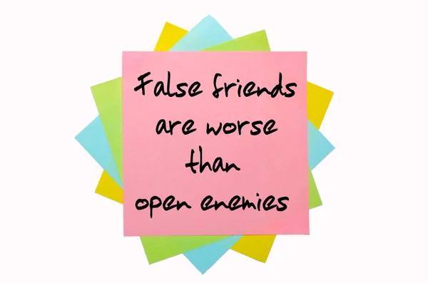 Proverb " False friends are worse than open enemies " written o — Stock Photo, Image