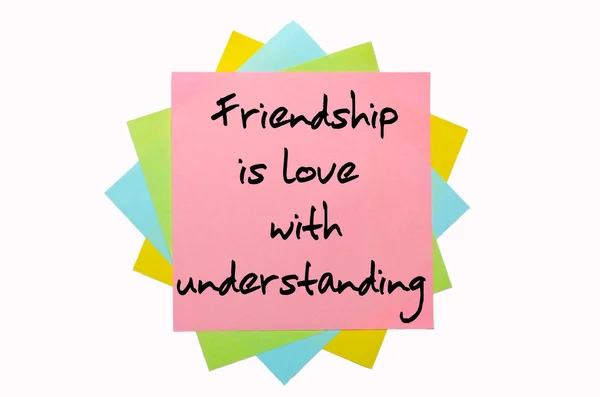 Proverb " Friendship is love with understanding " written on bu — Stock Photo, Image