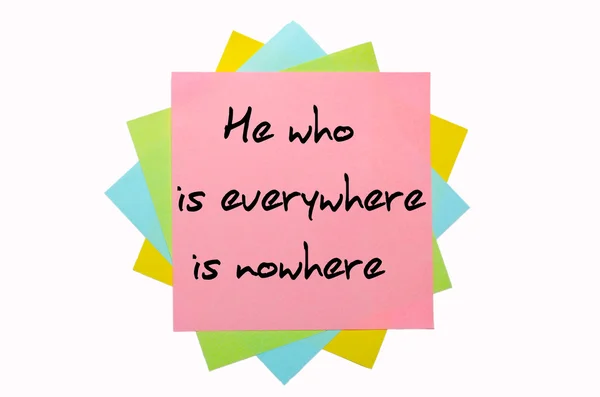 Proverb " He who is everywhere is nowhere " written on bunch of — Stock Photo, Image