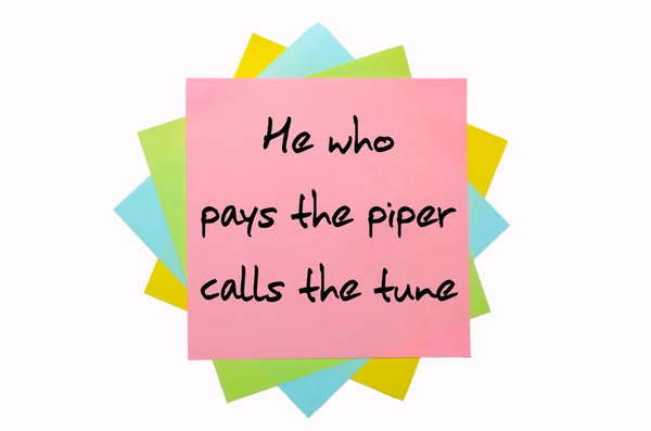 Proverb " He who pays the piper calls the tune " written on bunc — Stock Photo, Image
