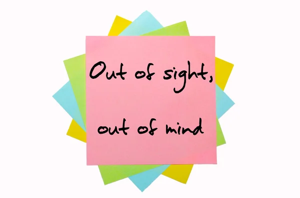 Proverb " Out of sight, out of mind " written on bunch of sticky — Stock Photo, Image