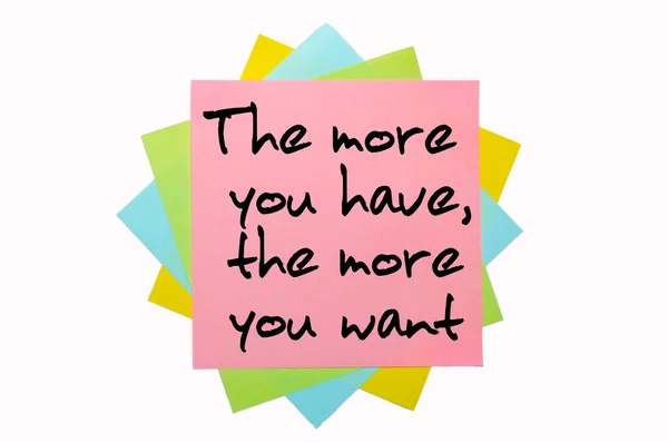 Proverbe "Plus vous avez, plus vous voulez" écrit sur bunc — Photo