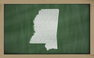 Outline map of mississippi on blackboard clipart