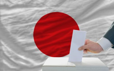 Man voting on elections in japan clipart