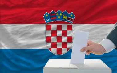 Man voting on elections in croatia clipart