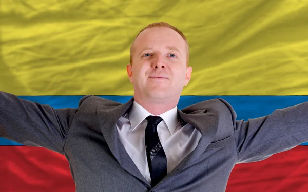 Glad affärsman på grund av lönsam investering i columbia s — Stockfoto