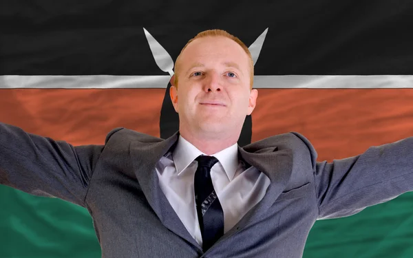Glücklicher Geschäftsmann wegen profitabler Investitionen in Kenia stan — Stockfoto