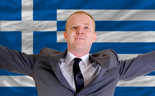 Biznesmen szczęśliwy z powodu zyskowną inwestycję w Grecji sta — Zdjęcie stockowe