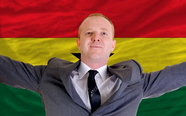 Happy businessman because of profitable investment in ghana stan