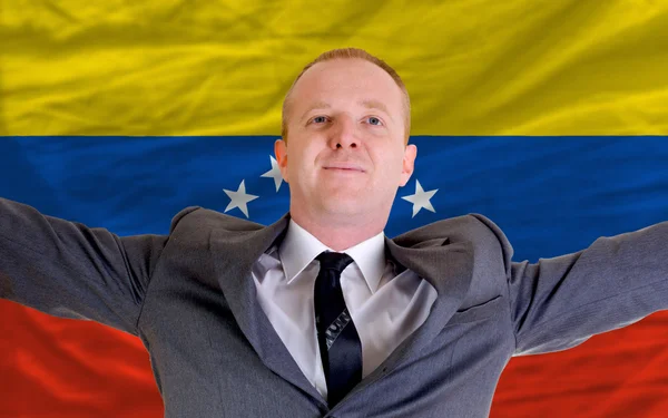 Glad affärsman på grund av lönsam investering i venezuela — Stockfoto