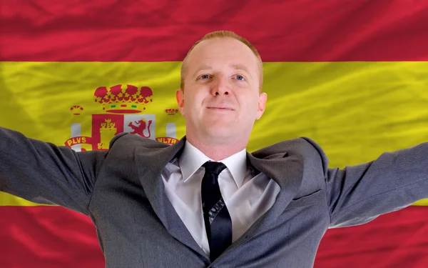 Glad affärsman på grund av lönsamma investeringar i Spanien stan — Stockfoto