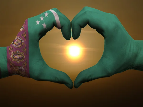 Heart and love gesture by hands colored in turkmenistan flag dur — Stock Photo, Image