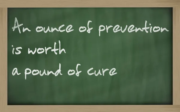 " An ounce of prevention is worth a pound of cure " written on a — Stock Photo, Image