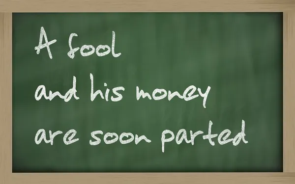 " Un tonto y su dinero pronto (fácilmente) se separan "escrito en un — Foto de Stock