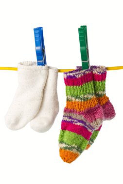 Four socks on a clothesline