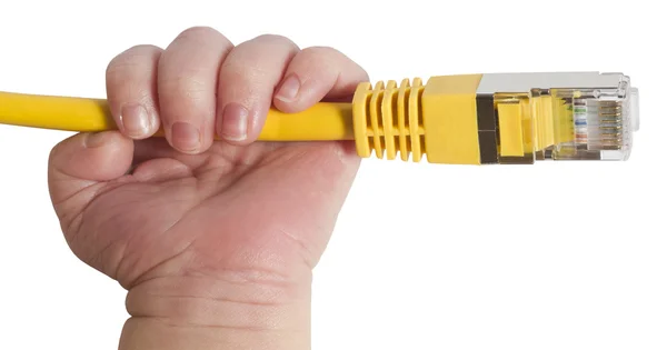 Baby holding yellow network plug — Stock Photo, Image