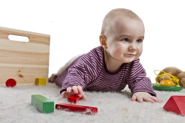 Baby spelen op verdieping — Stockfoto