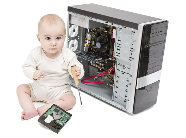 Young child working on open computer — Stock Photo, Image