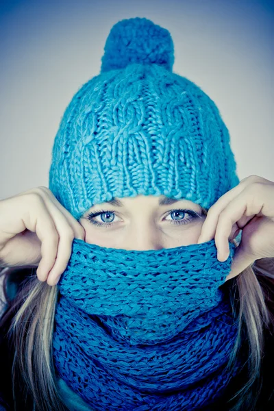Beautiful girl with a scarf hiding — Stock Photo, Image