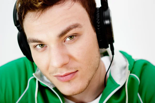 Portrait of a young man listen music with headphones — Stock Photo, Image