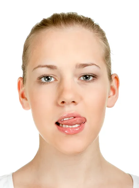 Cute girl shows tongue — Stock Photo, Image