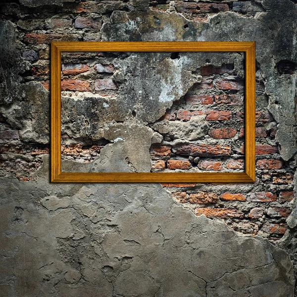 Picture frames on concrete wall — Stock Photo, Image