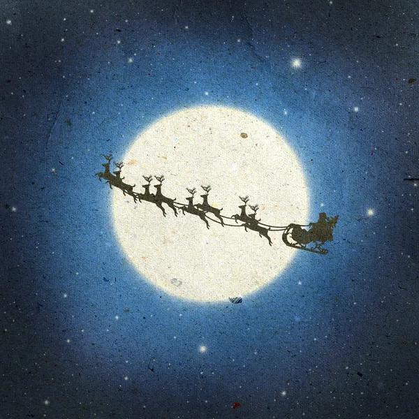 Noel Baba eski kağıt arka plan üzerinde kızak üzerinde — Stok fotoğraf