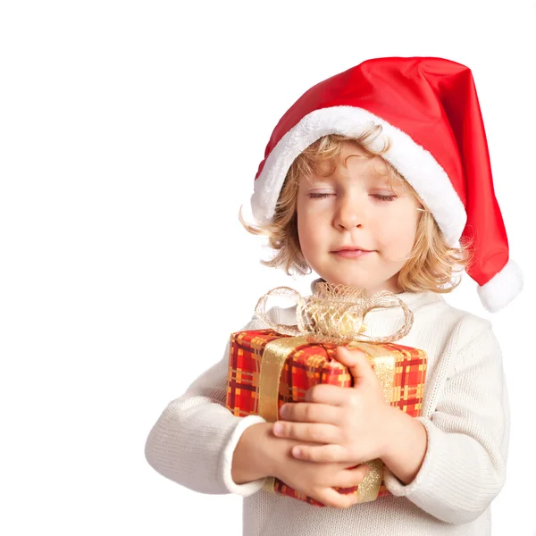 Baby holding Christmas gift — Stock Photo, Image