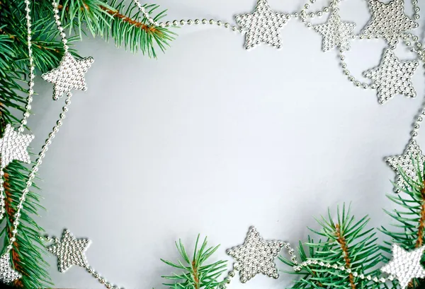 Vánoční rám z větve a hvězd — Stock fotografie