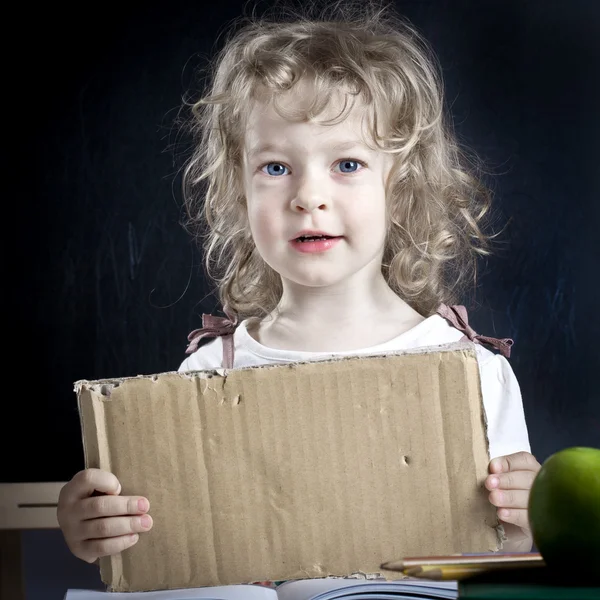 Schoolchild with paper blank — Stock Photo, Image