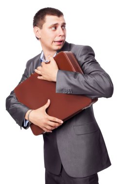 genç işadamı üzerinde beyaz backgrou izole portföy kucaklar