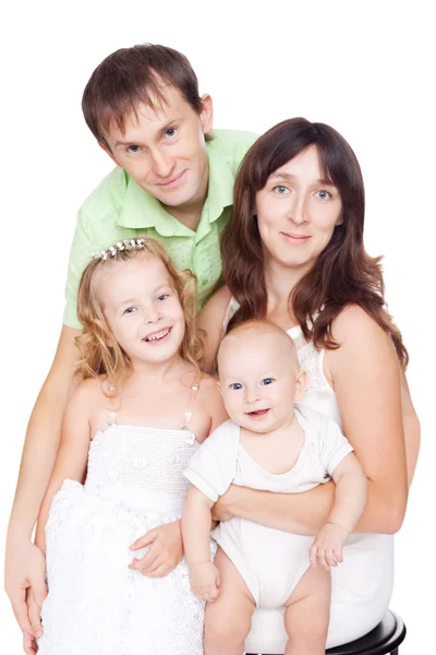 Счастливая семья с детьми изолированы на белом фоне — стоковое фото