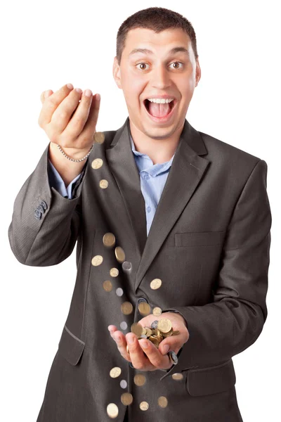 Happy rich businessman pouring coins isolated on white backgroun — Stock Photo, Image