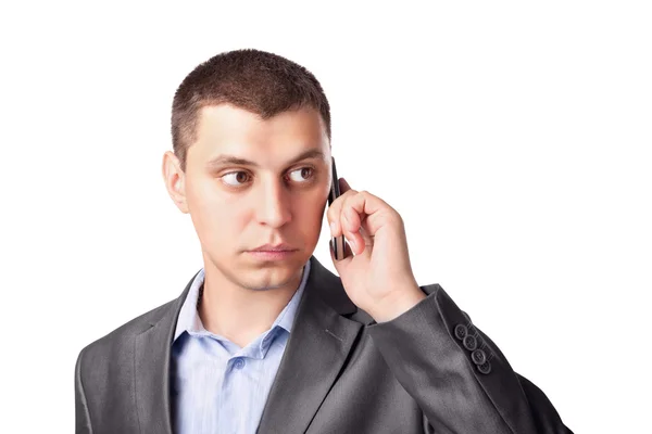 Ung affärsman som talar i hans mobiltelefon mobil isolerad på — Stockfoto