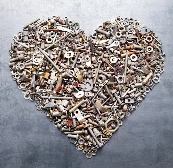 Assorted nuts and bolts heart — Stock Photo, Image