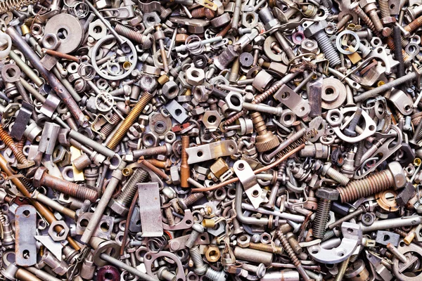 Assorted nuts and bolts background — Stock Photo, Image
