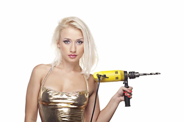Blonde model with a power drill — Stock Photo, Image