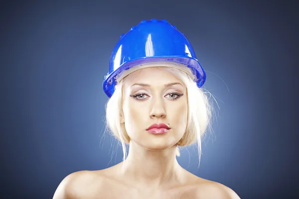Beautiful blonde with construction helmet — Stock Photo, Image