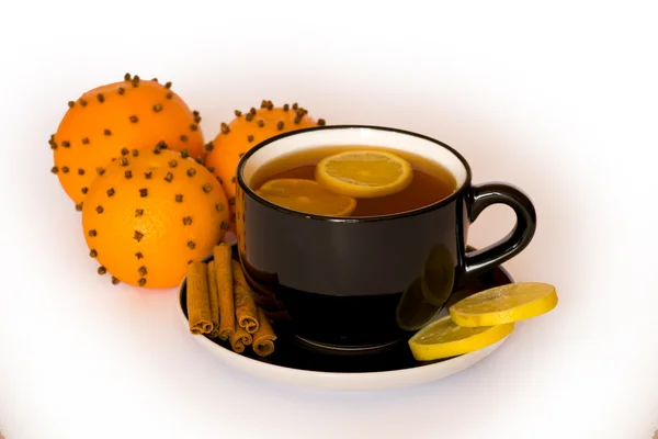 Warm drink with orange and lemon — Stock Photo, Image