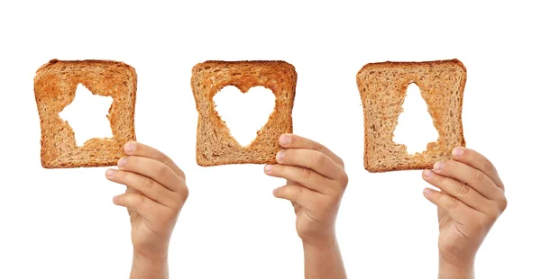 Kromki chleba z symbole świąteczne wycinanki — Zdjęcie stockowe