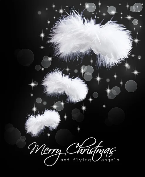 Tarjeta de Navidad con alas de ángel esponjosas — Foto de Stock