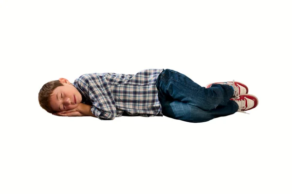 Niño que duerme estirado —  Fotos de Stock