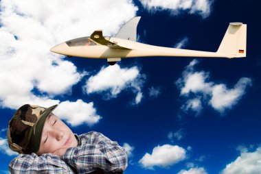 Child dreams to fly clipart