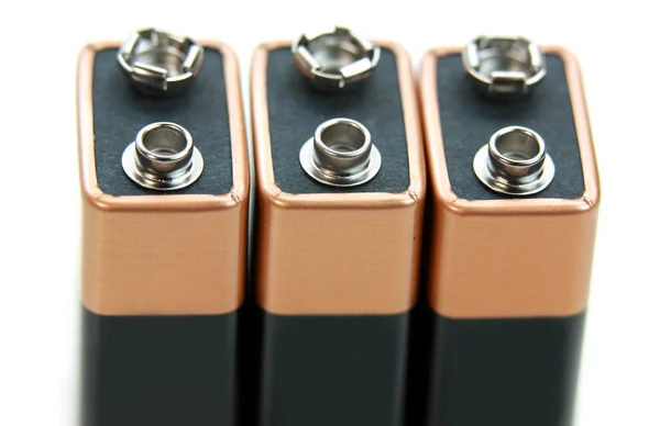 Tre nio volt batterier — Stockfoto