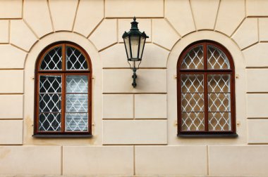 Renaissance windows with iron street lamp clipart