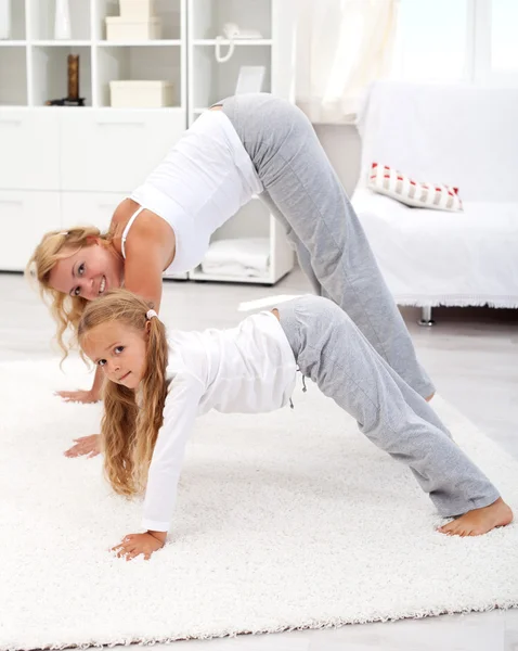 Stretching with mom in the morning — Stock Photo, Image