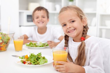 Kids eating a healthy meal clipart